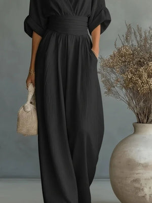 100% polyester Care instructions: Machine wash cold jumpsuit in Black with relaxed silhouette