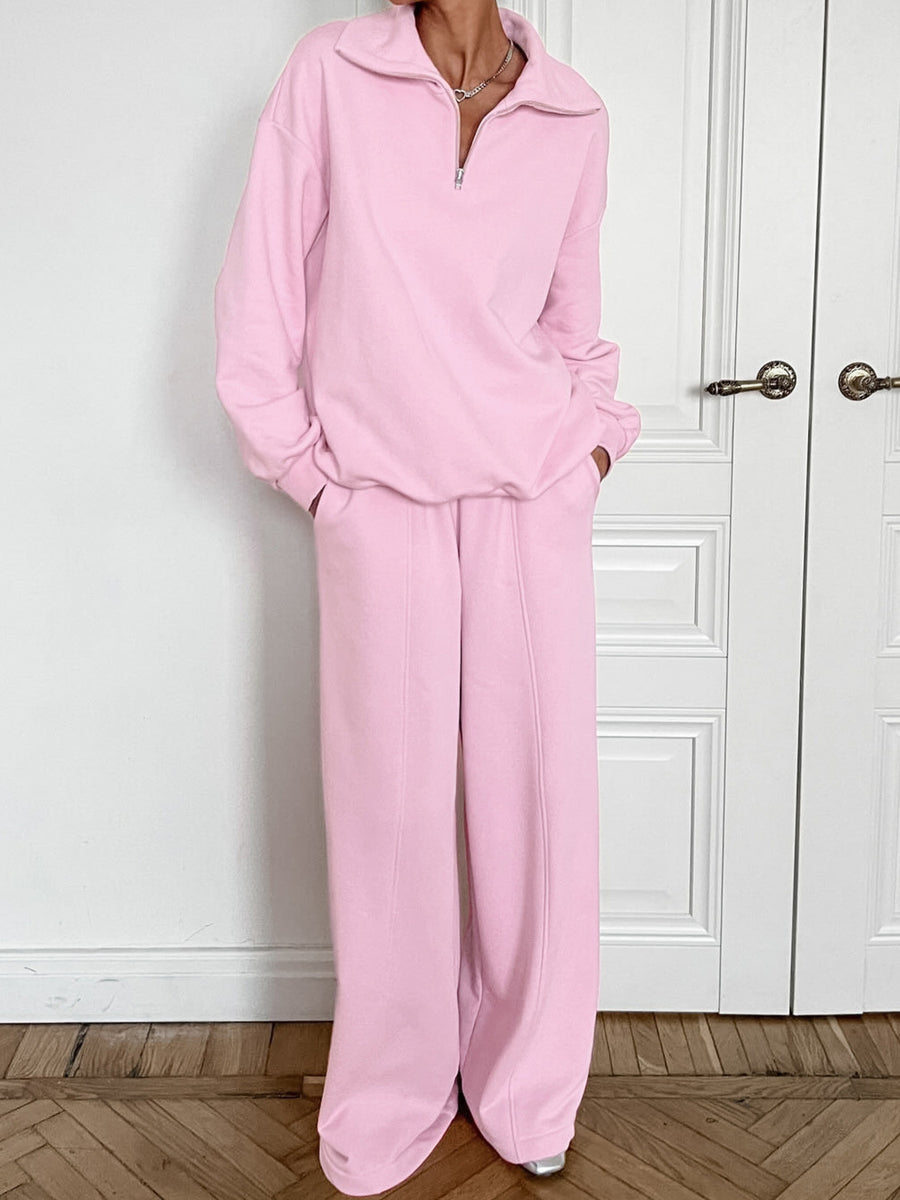 Blush pink quarter zip collared long sleeve top and wide leg pants set.
