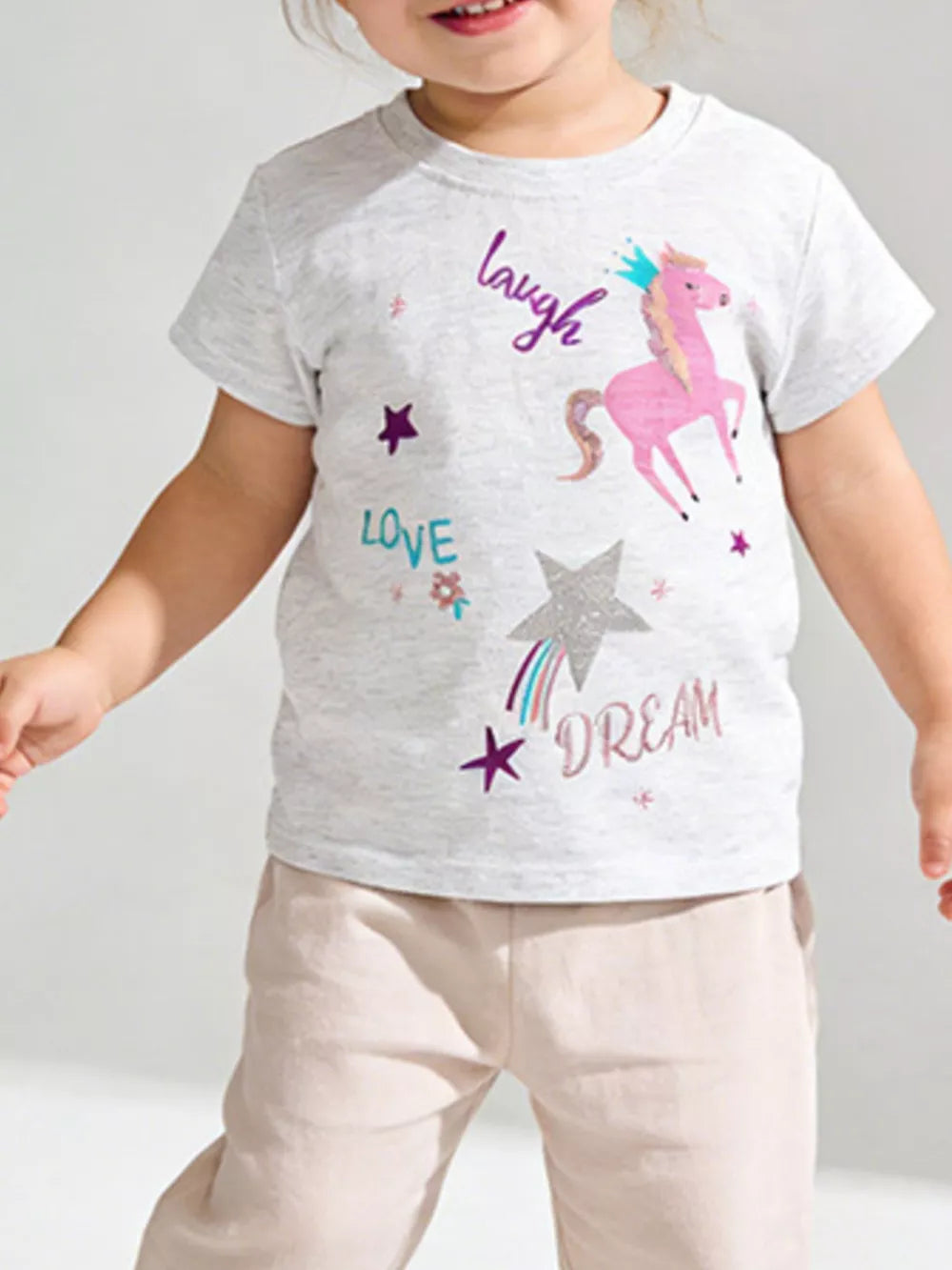 Whimsical unicorn graphic toddler t-shirt, relaxed fit, crew neck.