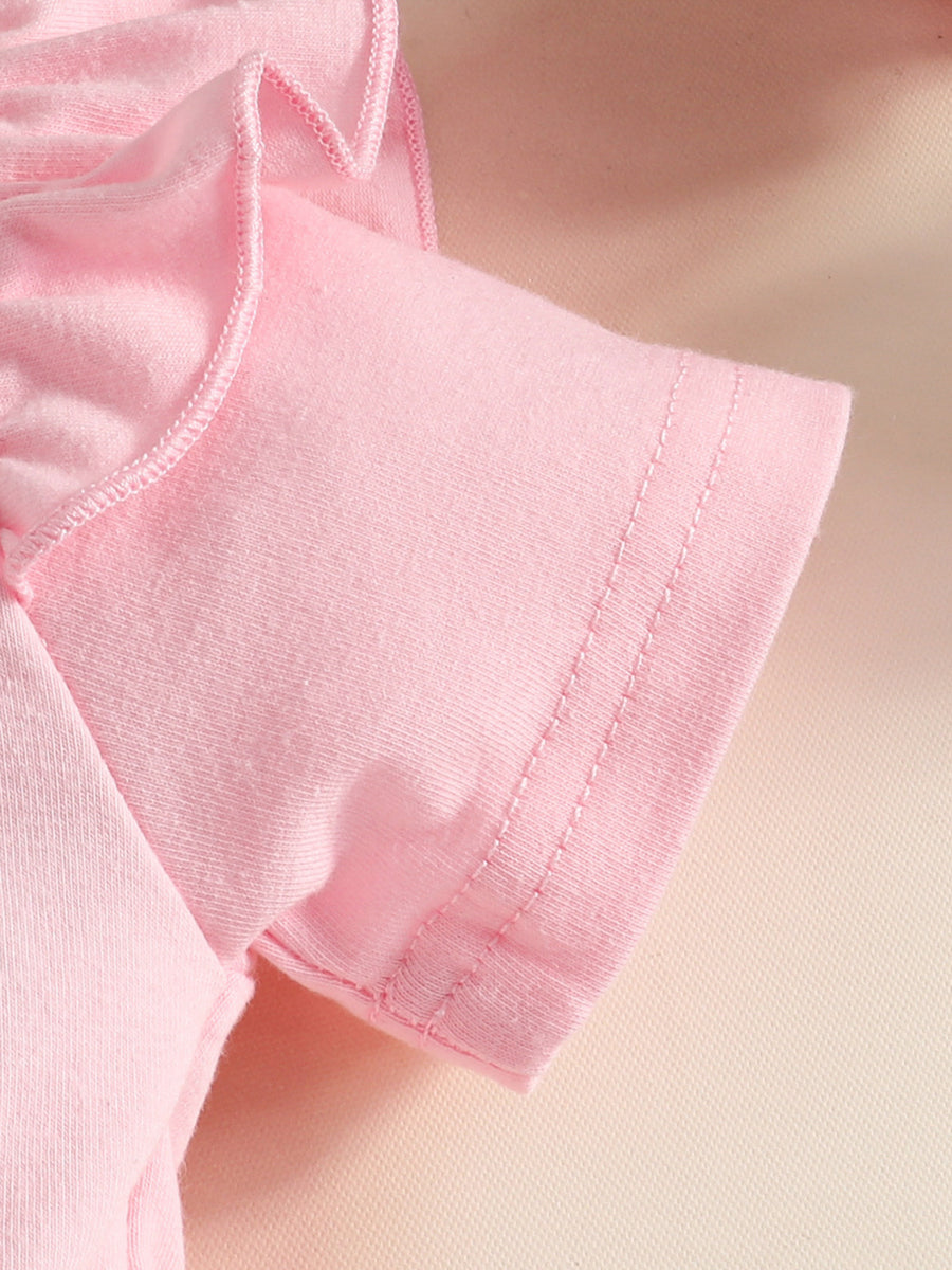 Pink baby dress with ruffled neckline detail and short sleeves.