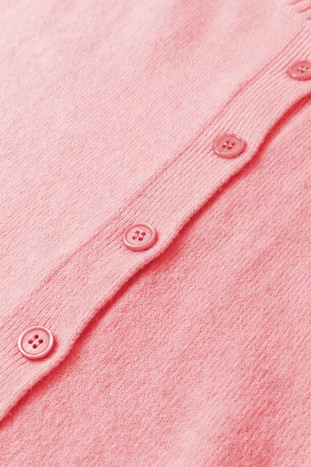 Pink acrylic knit cardigan with button front detail