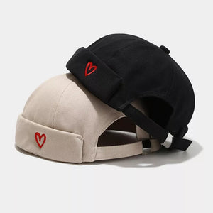 hat in black featuring embroidered and fitted fit