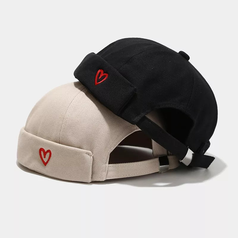 hat in black featuring embroidered and fitted fit