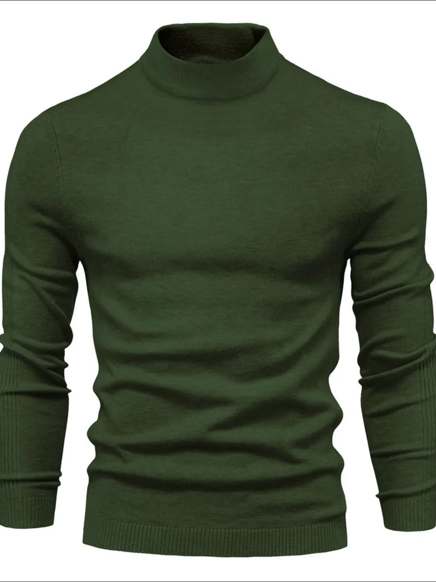 Army green ribbed mock neck sweater with long sleeves and sculpted shoulders.