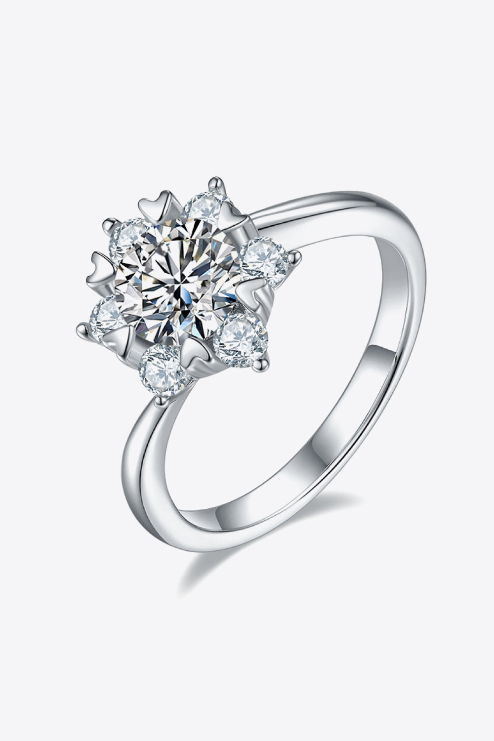 Silver floral cluster diamond ring made of 925 sterling silver with a central round cut diamond.
