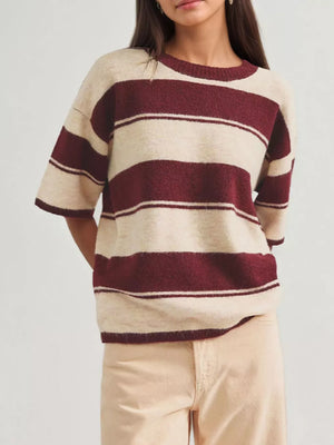 100% polyester Care instructions: Machine wash cold pullover sweater in Black with relaxed silhouette