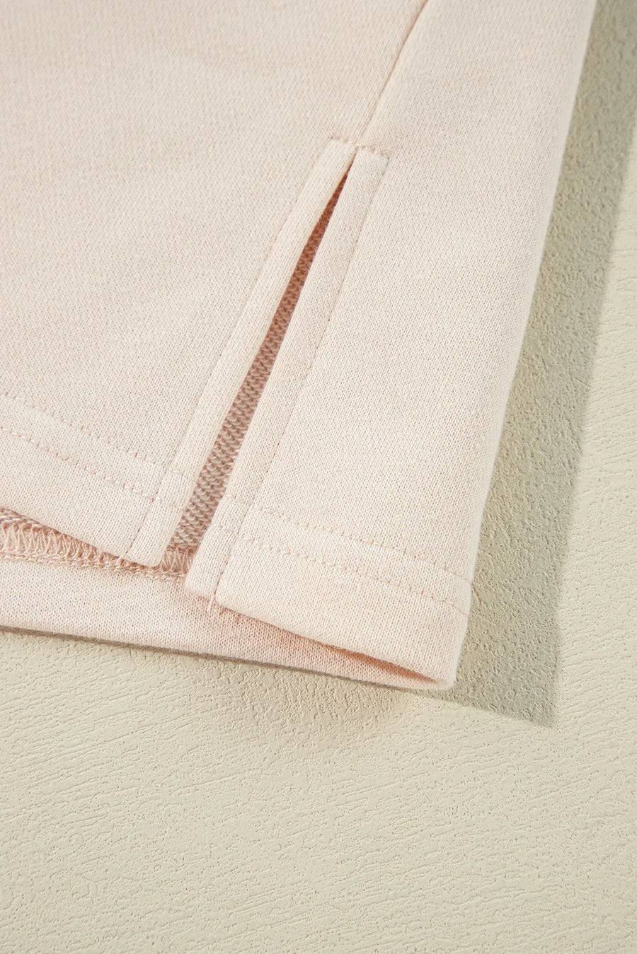 Sherbet sweatshirt with side slits and ribbed trim detail