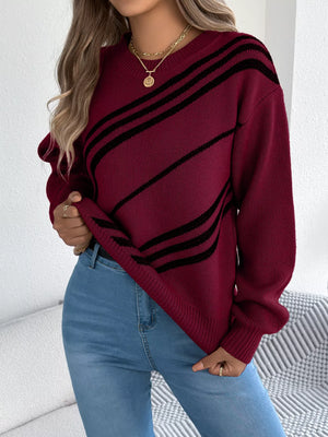 Red striped casual round-neck sweater with black diagonal stripes.