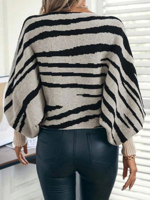 100% polyester Care instructions: Machine wash cold pullover sweater in Gray with relaxed silhouette