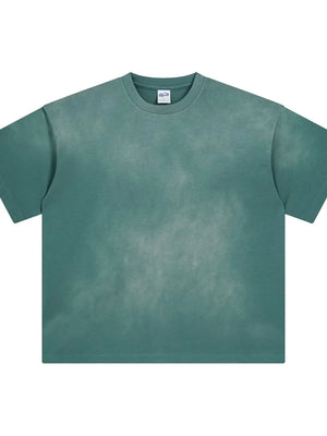 Oversized washed tee in deep teal with a relaxed fit and crew neck.