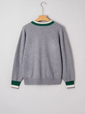 Gray V-neck sweater with green and white striped trim at neckline and cuffs.