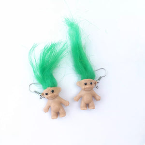 Green troll doll dangle earrings with fuzzy hair and hook backs.
