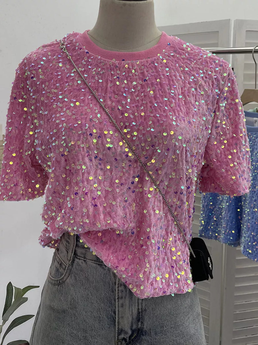 Pink iridescent sequin embellished t-shirt with crew neck and short sleeves.
