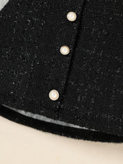 Black tweed skirt with pearl button detail