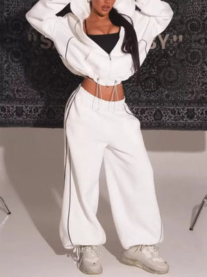 lounge set in white featuring contrast stitching and loose fit