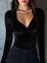 Black velvet ruched long sleeve t-shirt with subtle sparkle detail and deep V-neck.