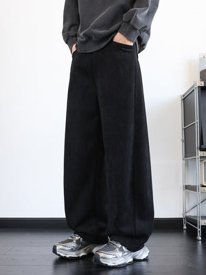 Men's black vintage washed wide leg sweatpants with pockets.