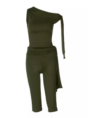 Olive green asymmetrical one-shoulder top and capri pants set with a tie waist detail.