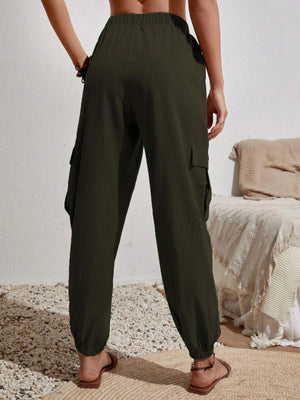 Dark green textured cargo lounge trousers with elasticated cuffs and patch pockets.