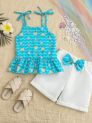 Blue seahorse print cami with ruffled hem and white shorts with bow detail