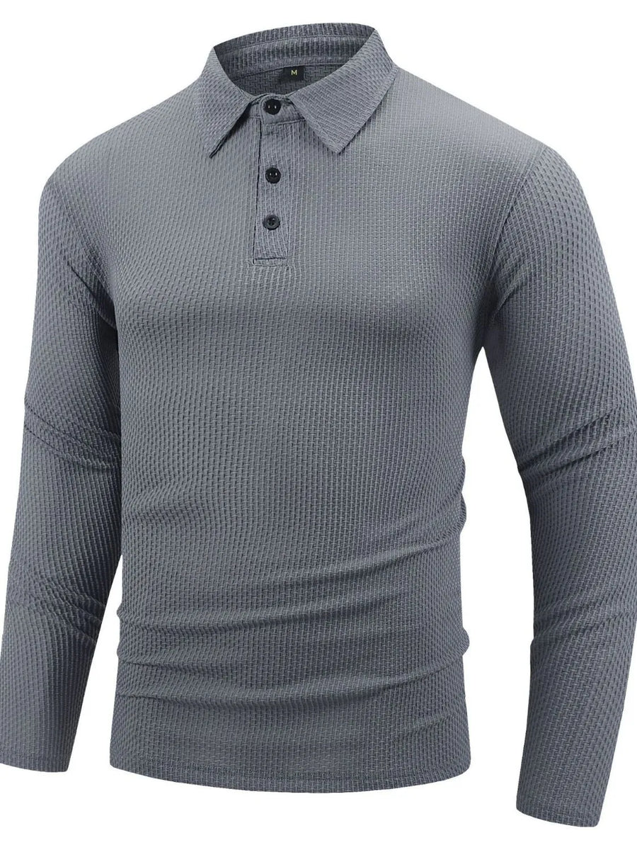 Gray textured long sleeve polo shirt with buttoned placket and articulated sleeves.