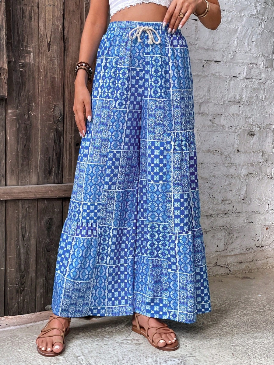 95% polyester, 5% elastane Care instructions: Machine wash cold wide-leg pants in white with flared silhouette