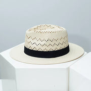Straw boater hat with black ribbon and open weave detail