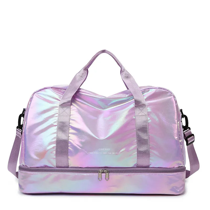 Iridescent pink purple duffel bag with separate compartment and dual handles.