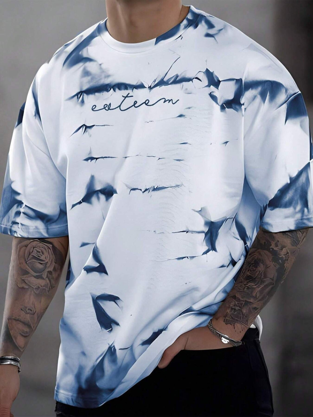 Abstract tie-dye oversized men's t-shirt in Dusty Blue with a crew neck and short sleeves.