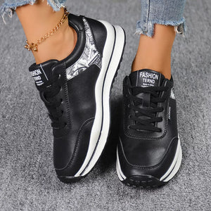 black sneakers featuring round toe and graphic-print