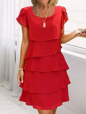 Ruffled tiered dress in scarlet with petal sleeves and a round neckline.