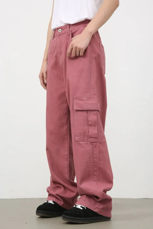 Dusty rose wide-leg cargo pants with a prominent side pocket detail.
