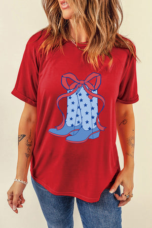 Red t-shirt with cowboy boot and bow graphic featuring stars