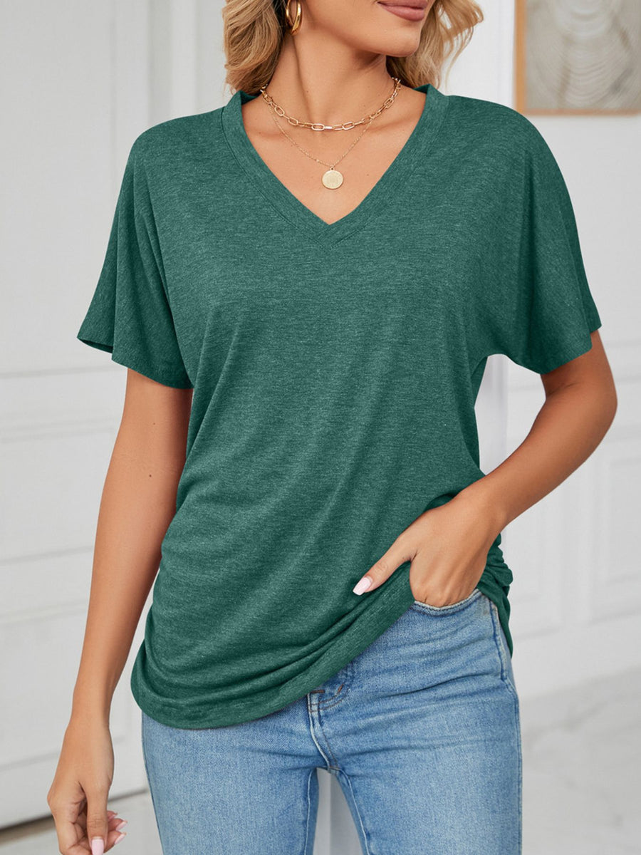 Relaxed V-neck short sleeve t-shirt in dark green with a draped fit.