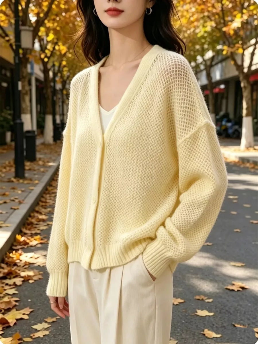 cream cardigan with button-front and open-knit