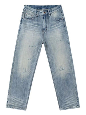 Men's relaxed wide-leg blue denim jeans with distressed details and a faded wash.
