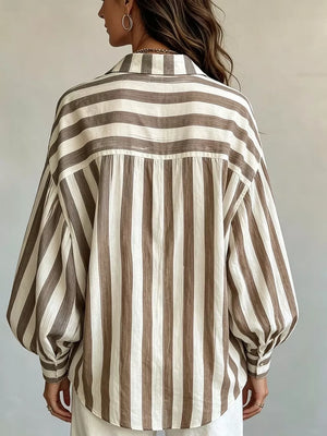 100% polyester Care instructions: Machine wash cold button-up shirt in Blue Stripes with loose silhouette