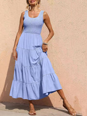 Light Blue smocked bodice ruffled maxi dress with tiered skirt.