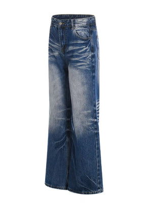 Men's light blue vintage wash wide leg jeans with distressed details