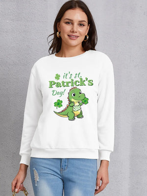 White St. Patrick's Day sweatshirt with a cartoon dinosaur holding a shamrock and text.