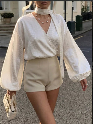 blouse in Beige with crocodile-embossed and balloon sleeve