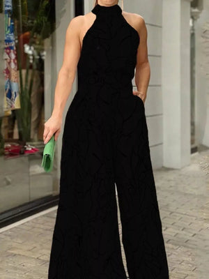 Black abstract print halter neck wide leg romper with pockets