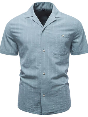 Light green striped short-sleeve button-front shirt with camp collar and chest pocket.