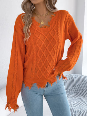 v-neck sweater in Orange with cable knit and distressed