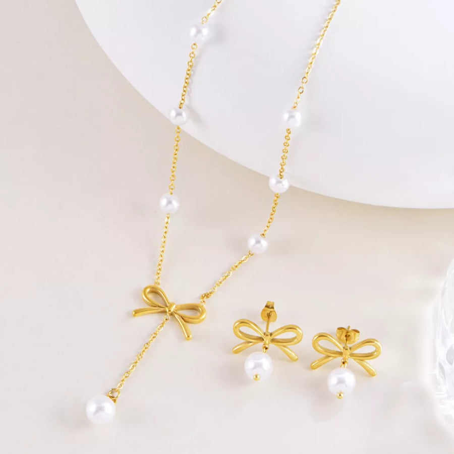 Synthetic Pearl, 18K Gold-Plated, Stainless Steel Care instructions: Avoid weari Jewelry Set in white with N/A silhouette