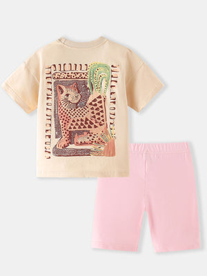 Toddler graphic tee with leopard print and pink biker shorts set.
