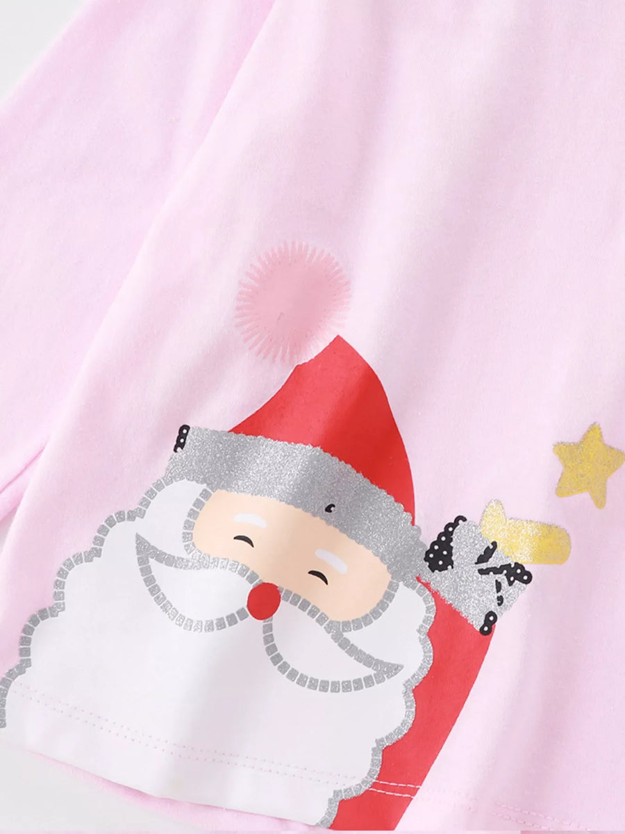 Blush pink cotton pajama top with a Santa Claus graphic and glitter accents.