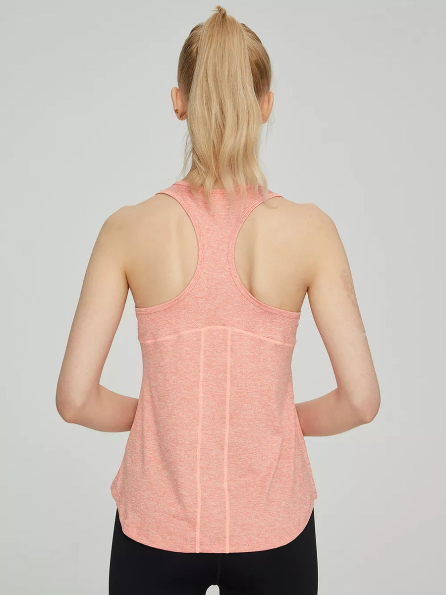 Peach marled racerback tank top with curved hem and vertical seam details.