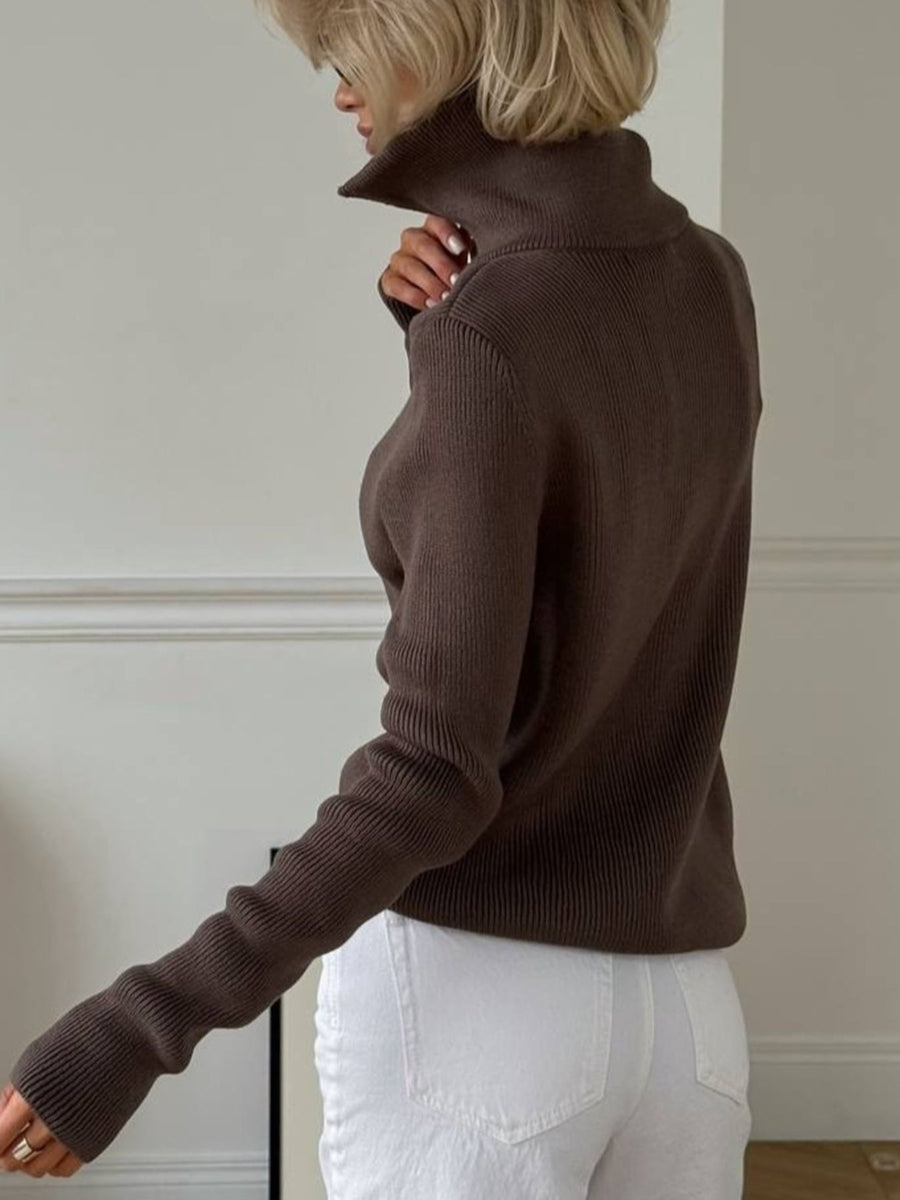 80% acrylic,20% polyester Care instructions: Machine wash cold zip-up sweater in Black with relaxed silhouette