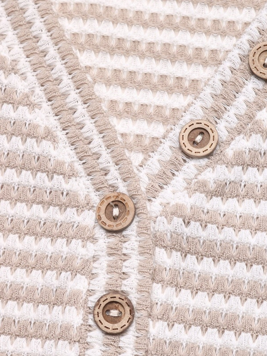 V-neck t-shirt with cap sleeves and wood buttons in a striped knit texture.
